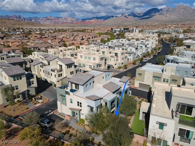 bird's eye view with a residential view and a mountain view
