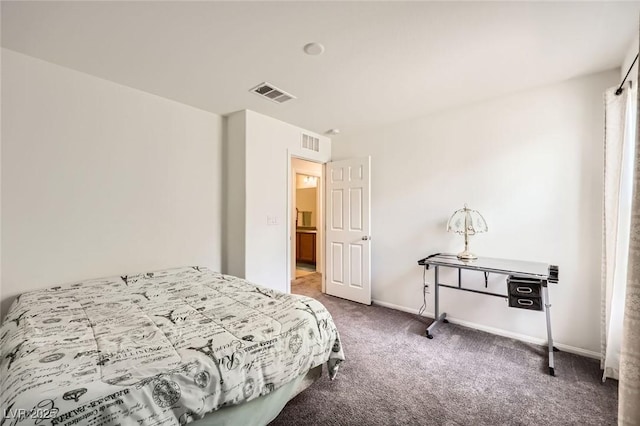 bedroom with baseboards, carpet, and visible vents