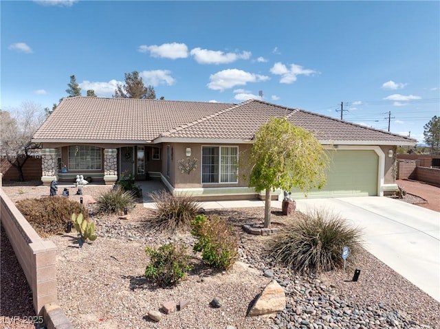 single story home with stucco siding, driveway, an attached garage, a tile roof, and fence