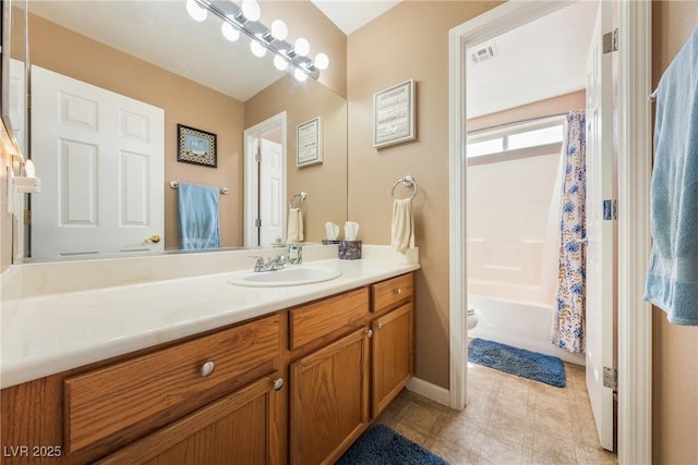 full bath with visible vents, toilet, shower / tub combo, and vanity
