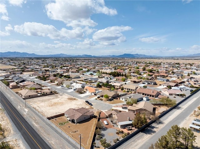 aerial view with a mountain view and a residential view