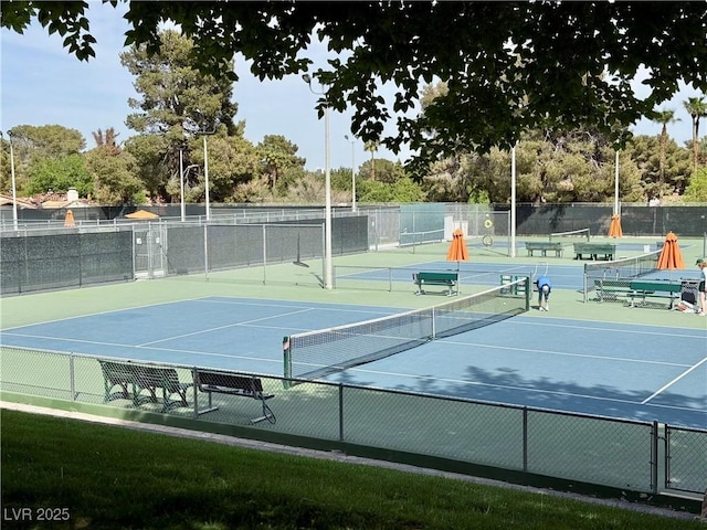 view of sport court featuring fence and community basketball court