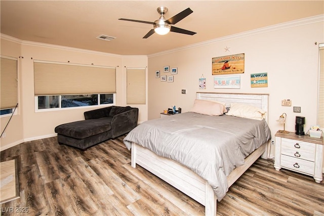 1017 Fairbury St, Henderson, NV 89052 - bedroom featuring wood finished floors, ornamental molding, ceiling fan, and visible vents