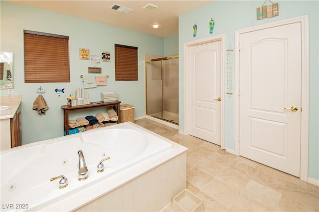 1017 Fairbury St, Henderson, NV 89052 - bathroom with vanity, visible vents, a tub with jets, and a shower stall