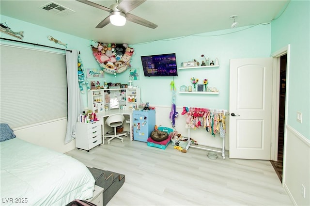 1017 Fairbury St, Henderson, NV 89052 - bedroom featuring visible vents, wood finished floors, and a ceiling fan
