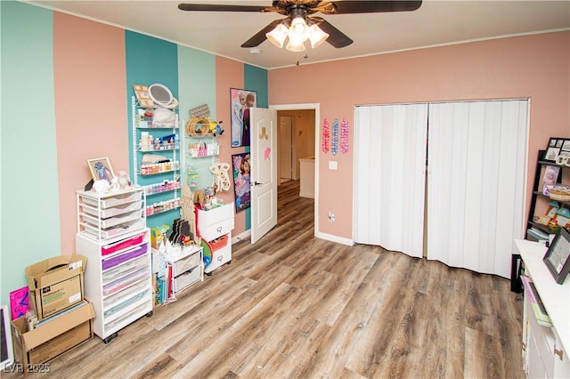 1017 Fairbury St, Henderson, NV 89052 - rec room featuring a ceiling fan, baseboards, and wood finished floors