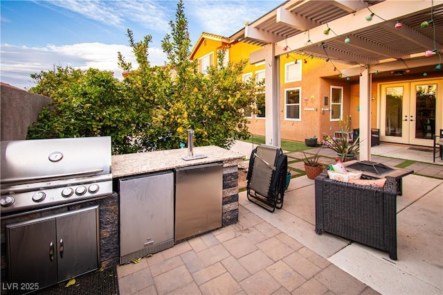 1017 Fairbury St, Henderson, NV 89052 - view of patio featuring french doors, grilling area, an outdoor fire pit, area for grilling, and a pergola