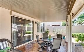 view of patio with outdoor dining area