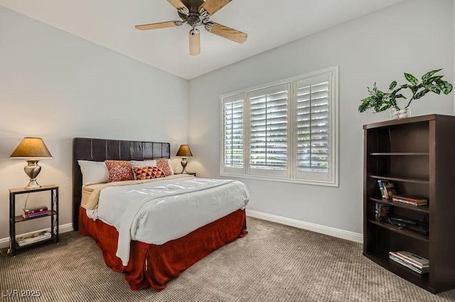 bedroom featuring carpet flooring, ceiling fan, baseboards, and lofted ceiling