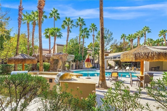 5250 S Rainbow Blvd Unit 1131, Las Vegas, NV 89118 - community pool featuring a patio area