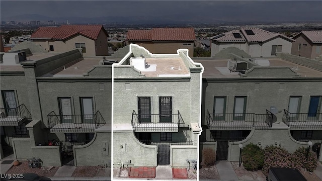 view of property with a residential view