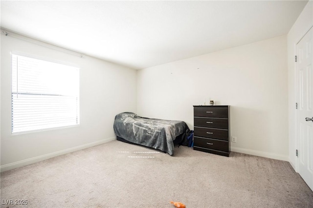 3135 S Mojave Rd Unit 241, Las Vegas, NV 89121 - carpeted bedroom featuring baseboards
