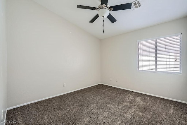 unfurnished room with ceiling fan, baseboards, carpet, and visible vents