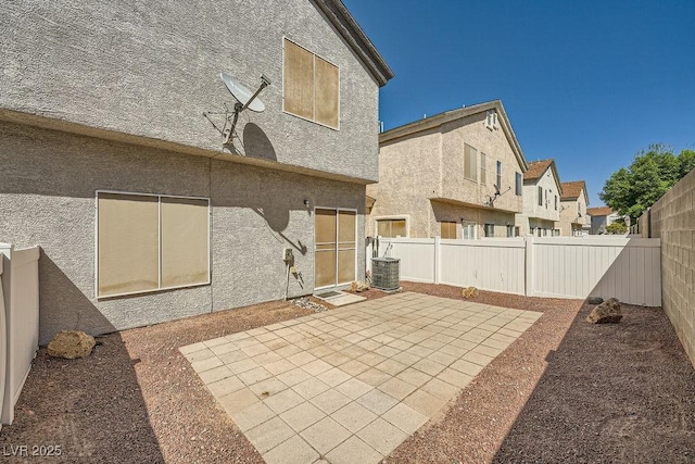 exterior space with a fenced backyard and a residential view