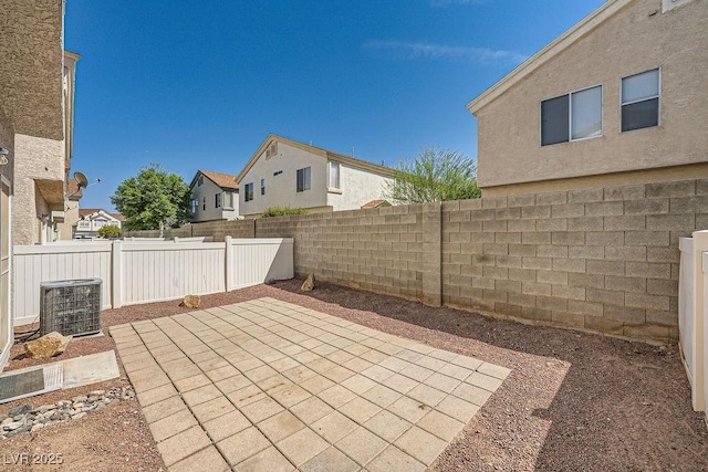 view of patio / terrace featuring a fenced backyard and cooling unit