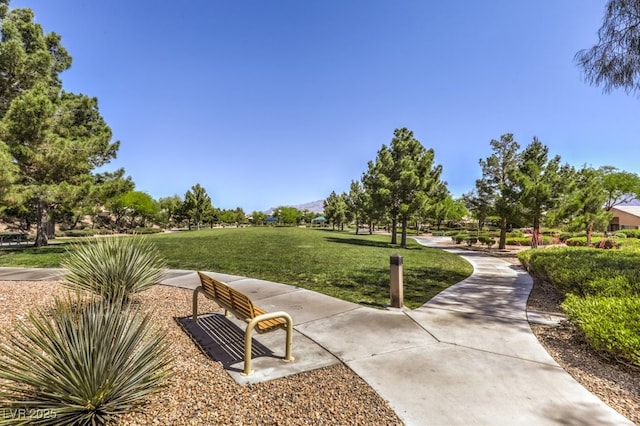 view of home's community with a lawn