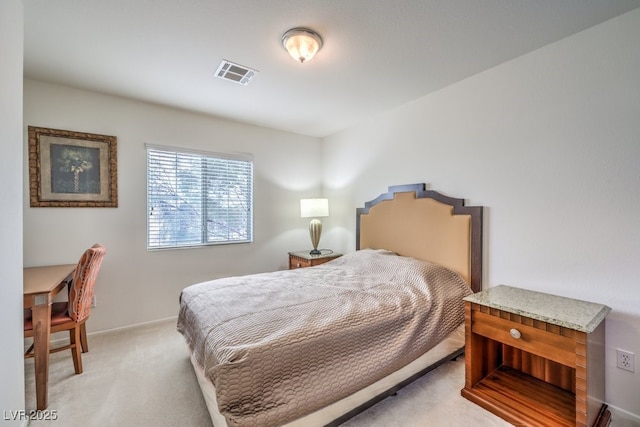 bedroom with baseboards, visible vents, and light colored carpet