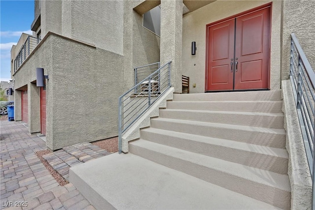 9830 Wild Coyote Ct, Las Vegas, NV 89141 - property entrance with stucco siding
