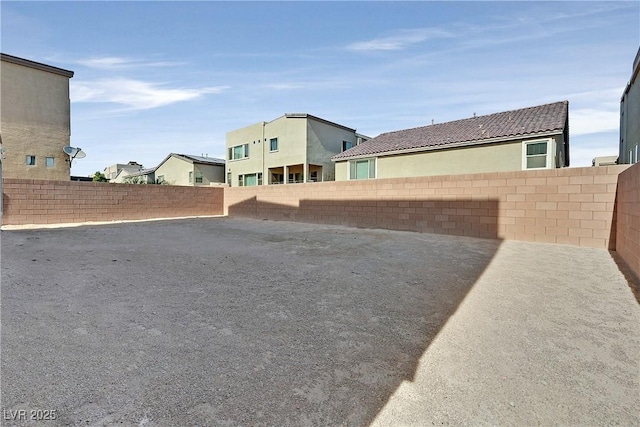 9830 Wild Coyote Ct, Las Vegas, NV 89141 - fenced backyard with a residential view