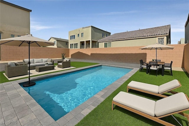 9830 Wild Coyote Ct, Las Vegas, NV 89141 - view of pool featuring outdoor lounge area, a fenced backyard, and a patio area
