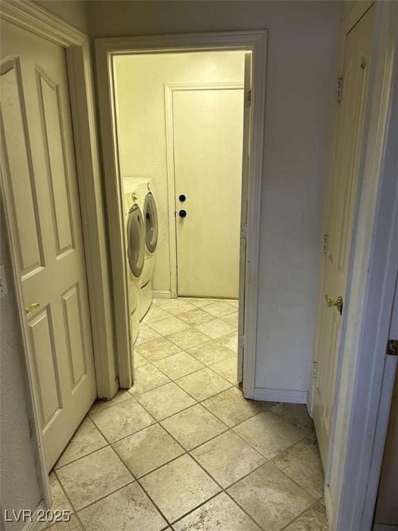 washroom featuring independent washer and dryer and laundry area