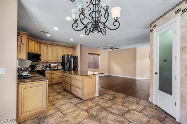 10437 Walworth Ave, Las Vegas, NV 89166 - kitchen featuring recessed lighting, black fridge, a center island, light brown cabinets, and baseboards