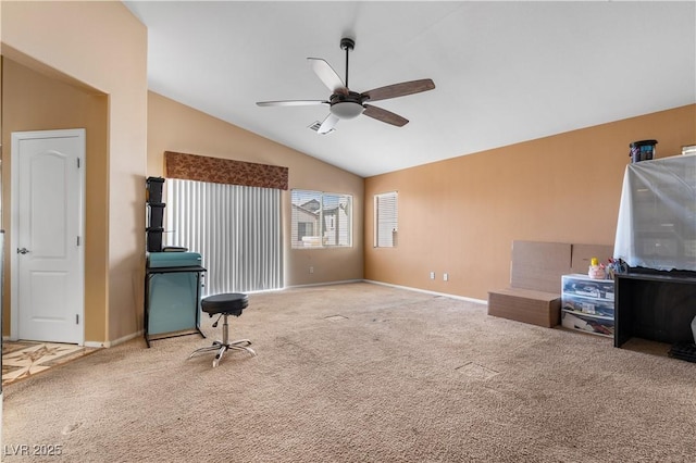 10437 Walworth Ave, Las Vegas, NV 89166 - carpeted living room with vaulted ceiling, baseboards, and a ceiling fan