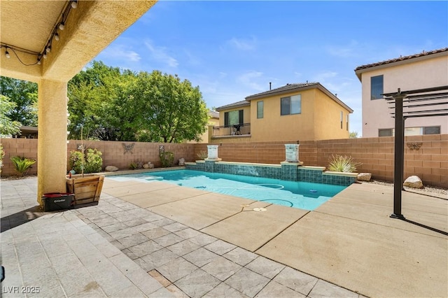 10437 Walworth Ave, Las Vegas, NV 89166 - view of pool featuring a patio, a fenced in pool, and a fenced backyard