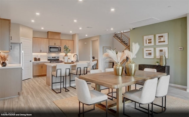 312 Parawan St Lot 12, Henderson, NV 89015 - dining room featuring light wood finished floors, baseboards, recessed lighting, and stairway