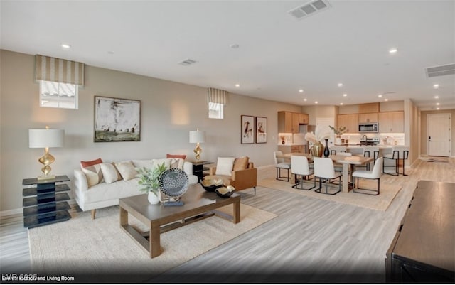 312 Parawan St Lot 12, Henderson, NV 89015 - living room with visible vents, light wood-style floors, and recessed lighting