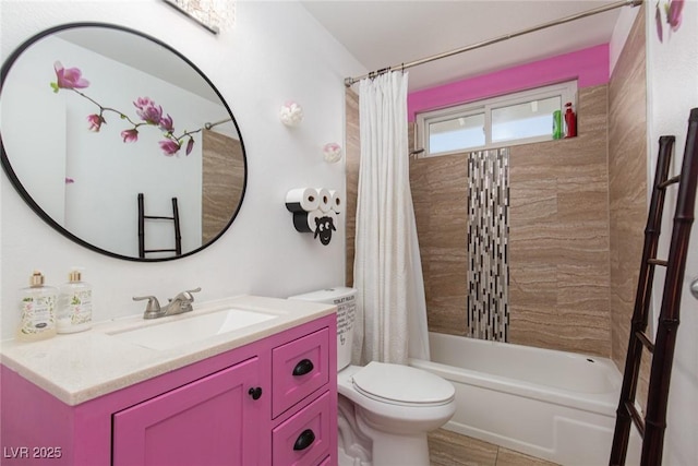 full bath with toilet, shower / bath combo, and vanity