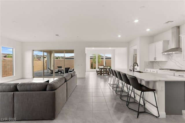 31 Autumn Palm Ave, Henderson, NV 89011 - living room with recessed lighting and light tile patterned floors
