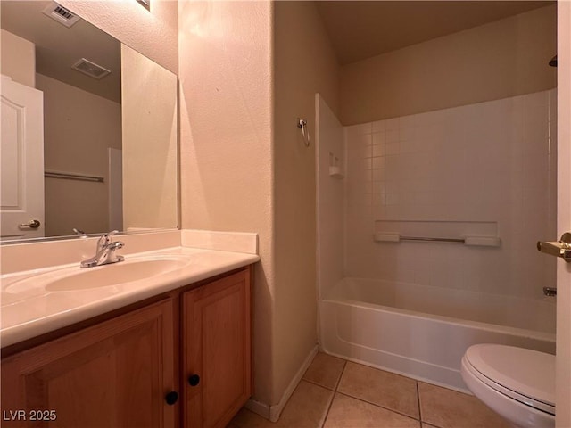 6080 Golden Corral Trl Unit 103, Henderson, NV 89011 - bathroom with tile patterned flooring, toilet, vanity, and tub / shower combination