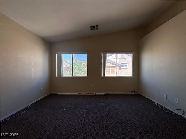 6080 Golden Corral Trl Unit 103, Henderson, NV 89011 - unfurnished room featuring vaulted ceiling, dark carpet, and baseboards