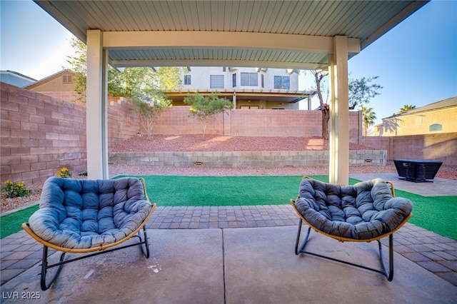 view of patio / terrace with a fenced backyard and an outdoor living space