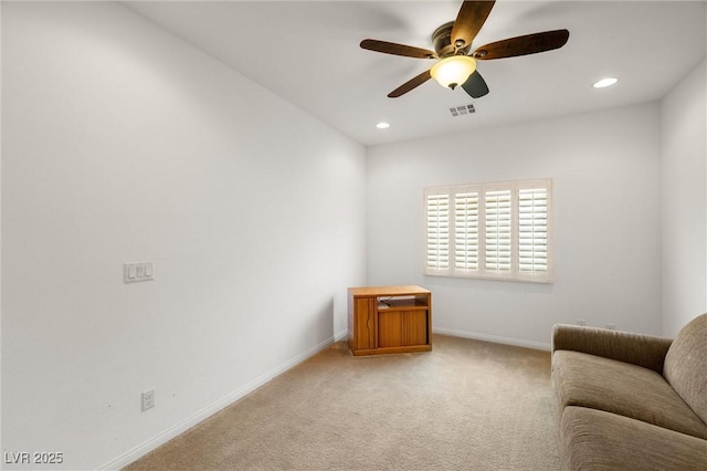 5224 E San Palo Dr, Pahrump, NV 89061 - unfurnished room with baseboards, visible vents, a ceiling fan, and light carpet