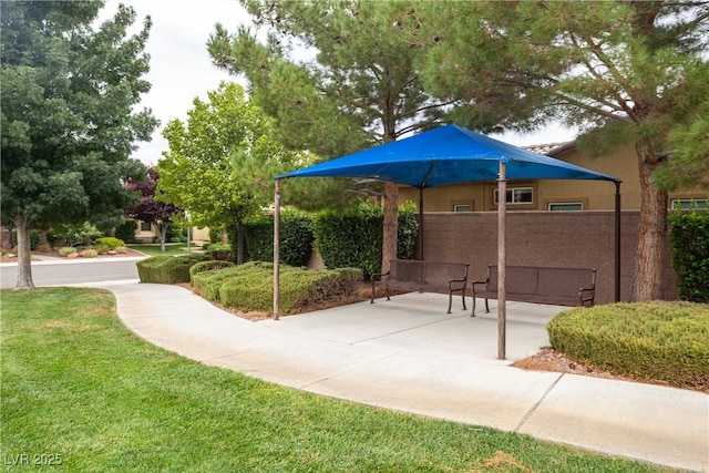 5224 E San Palo Dr, Pahrump, NV 89061 - view of home's community with a yard, fence, and a patio area