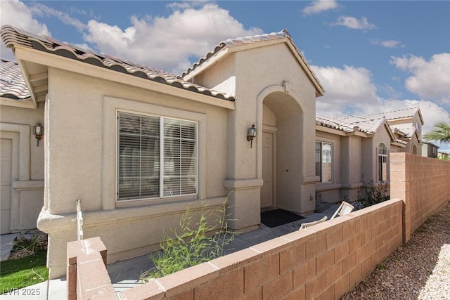 2691 Rimpacific Cir, Las Vegas, NV 89146 - mediterranean / spanish-style house with a tile roof and stucco siding