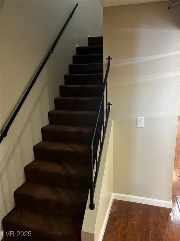 2541 Love St, Las Vegas, NV 89121 - stairs with wood-type flooring and baseboards