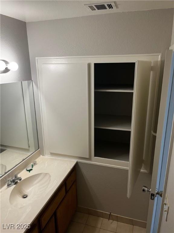 2541 Love St, Las Vegas, NV 89121 - bathroom featuring tile patterned flooring and vanity