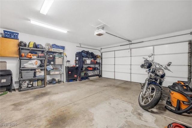 9578 Teton Vista Ave, Las Vegas, NV 89117 - garage featuring a garage door opener