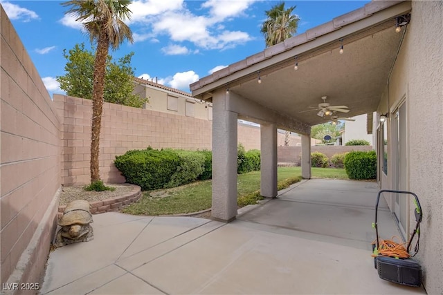view of patio / terrace with ceiling fan and a fenced backyard