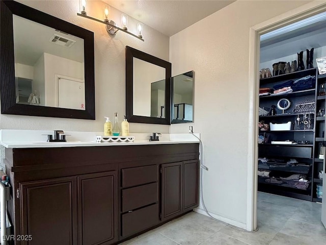 8532 Caddy Corner St, Las Vegas, NV 89139 - full bath featuring double vanity and tile patterned floors