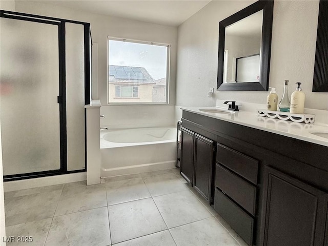 8532 Caddy Corner St, Las Vegas, NV 89139 - bathroom with a stall shower, double vanity, and a bath