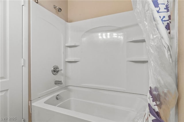 full bath featuring shower / tub combo with curtain