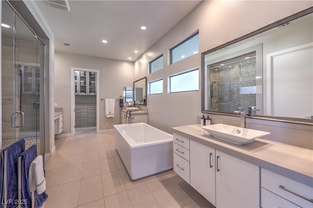 10 Sugarberry Ln, Las Vegas, NV 89135 - full bath with a shower stall, tile patterned floors, recessed lighting, vanity, and a freestanding bath