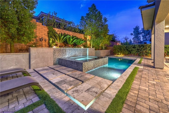 10 Sugarberry Ln, Las Vegas, NV 89135 - view of swimming pool with an in-ground hot tub, a fenced backyard, and a patio area