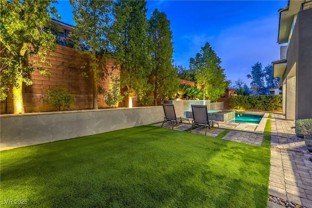 10 Sugarberry Ln, Las Vegas, NV 89135 - view of yard featuring a patio area and an in-ground hot tub