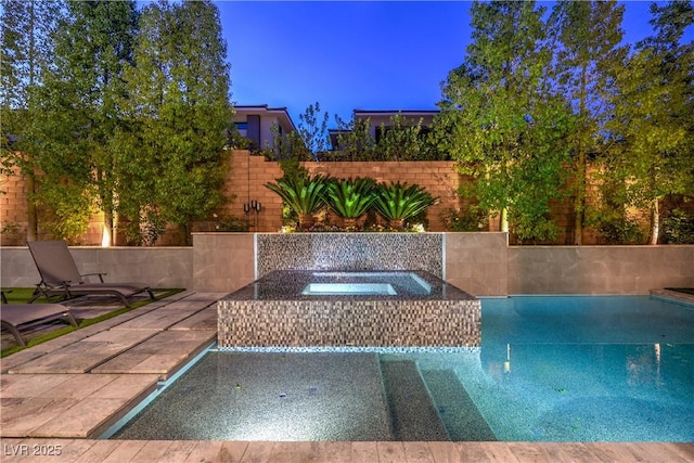 10 Sugarberry Ln, Las Vegas, NV 89135 - view of pool with an in-ground hot tub and a patio