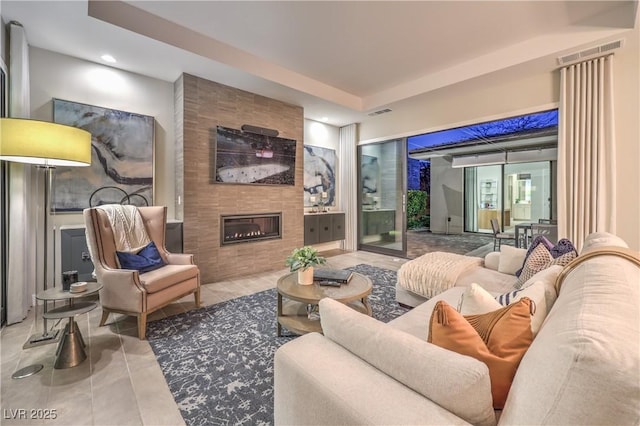 10 Sugarberry Ln, Las Vegas, NV 89135 - living area featuring a tiled fireplace, recessed lighting, and tile patterned flooring